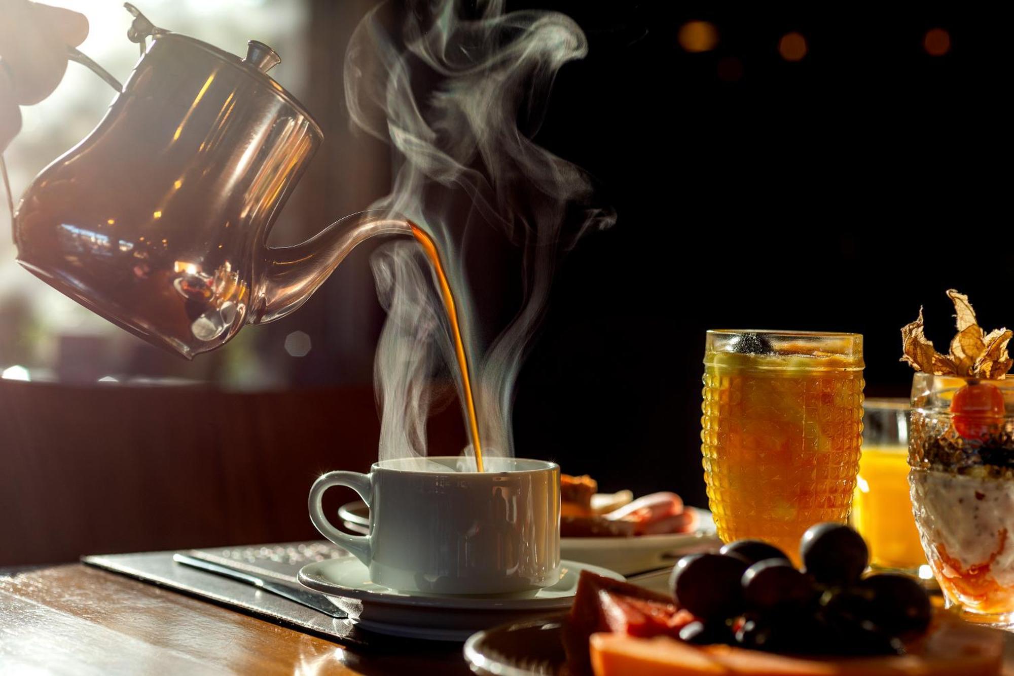 Hotel Laghetto Stilo Borges グラマド エクステリア 写真 Coffee being poured